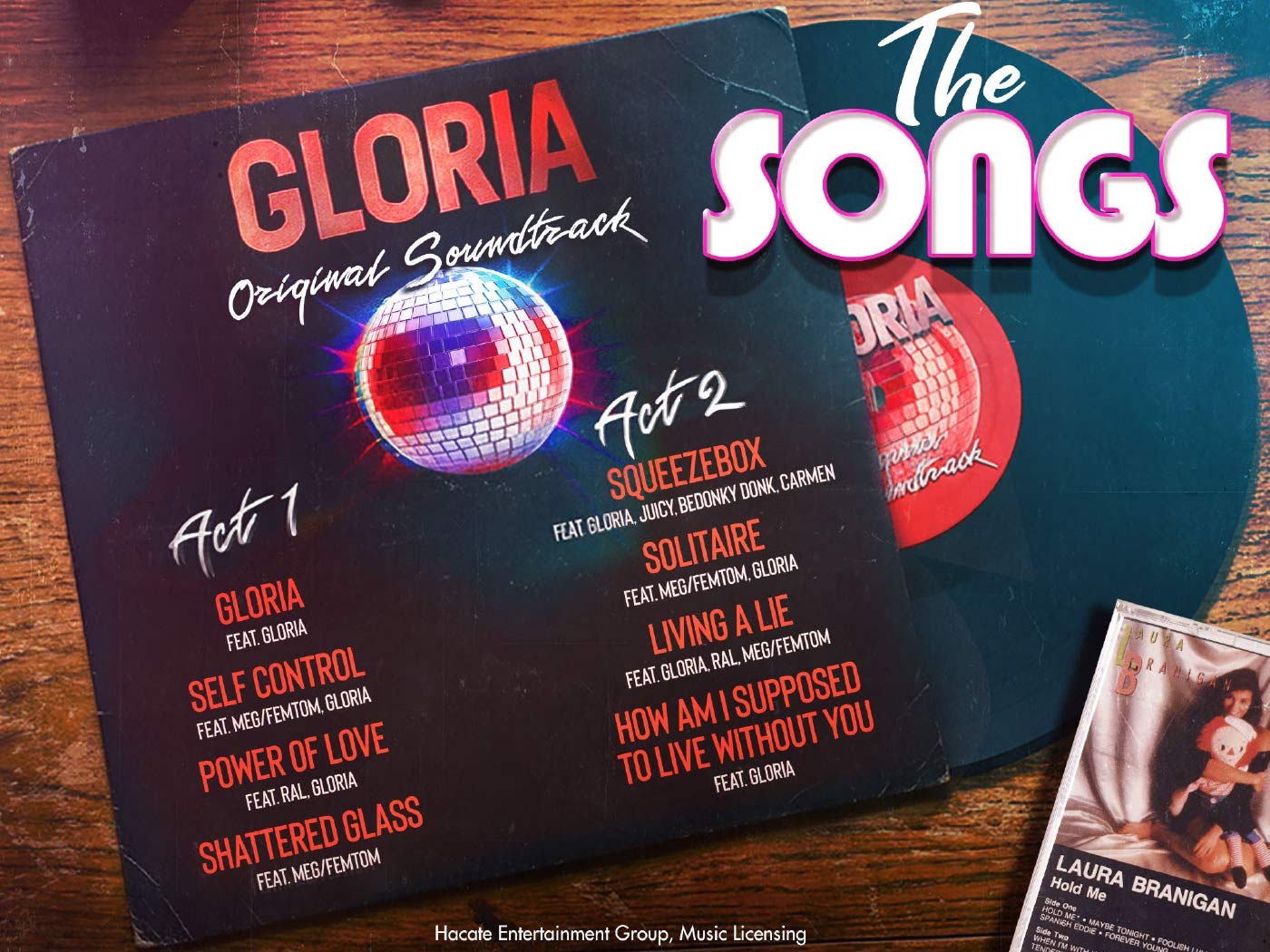 Vinyl record set with 'Gloria' soundtrack cover and disc on a wooden surface. 